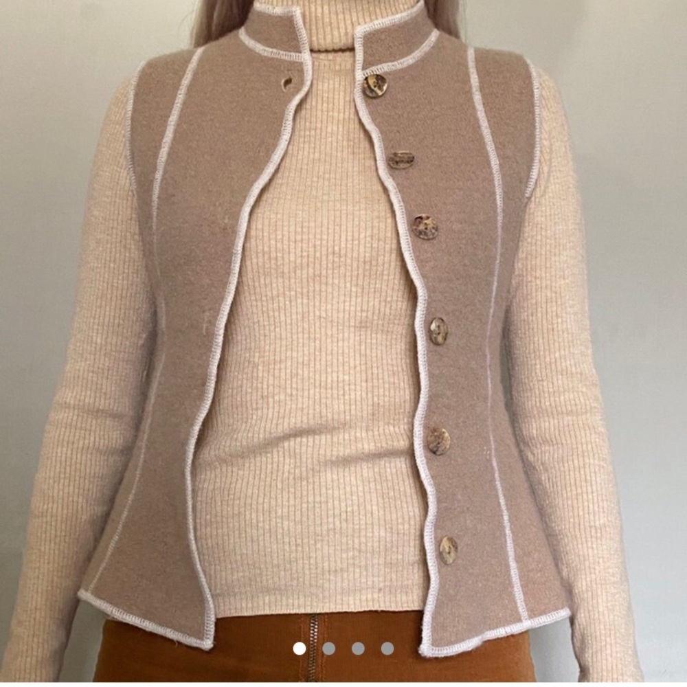Vintage wool vest with unique buttons.